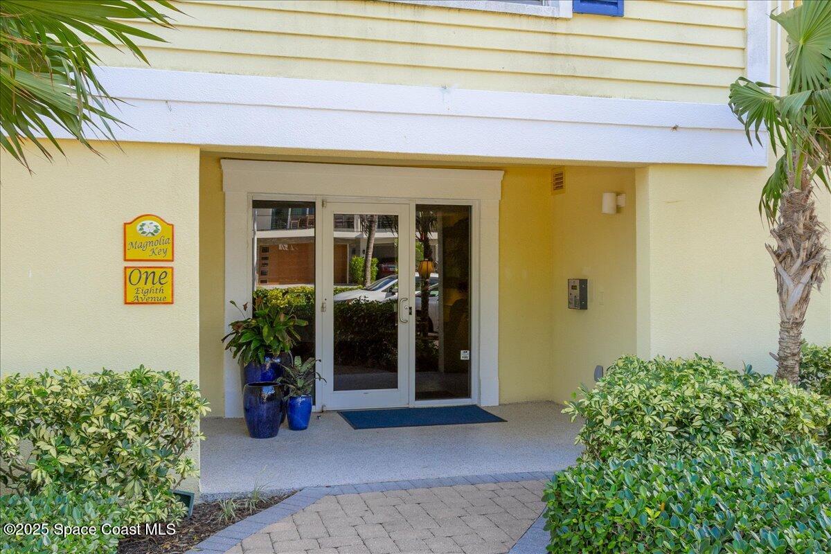 1 8th Avenue, Unit 1403 Indialantic, FL 32903 - Photo 31 of 69 a view of a entryway door of the house