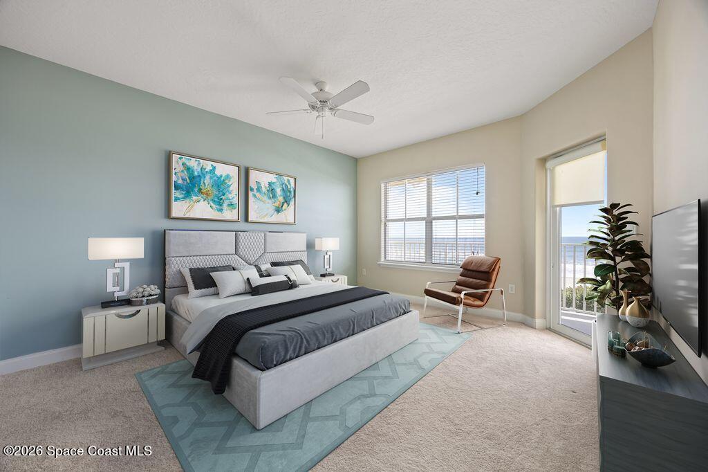 1 8th Avenue, Unit 1403 Indialantic, FL 32903 - Photo 44 of 69 a bedroom with a bed and a couch