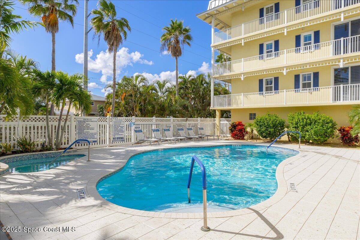 1 8th Avenue, Unit 1403 Indialantic, FL 32903 - Photo 68 of 69 a view of a swimming pool with a patio