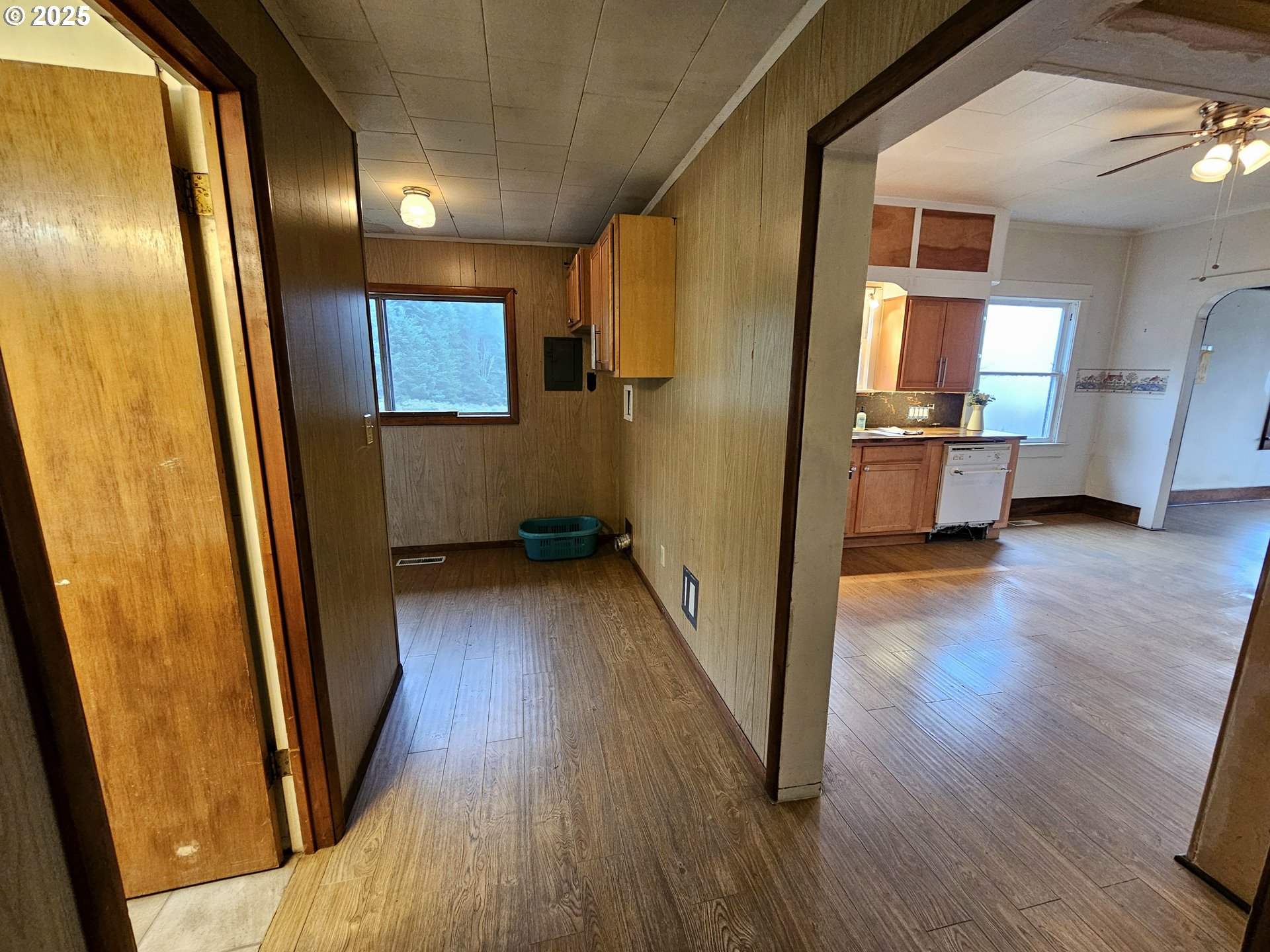 32373 Southwest JP W Road Scappoose, OR 97056 - Photo 16 of 44 a view of a hallway with wooden floor and stairs