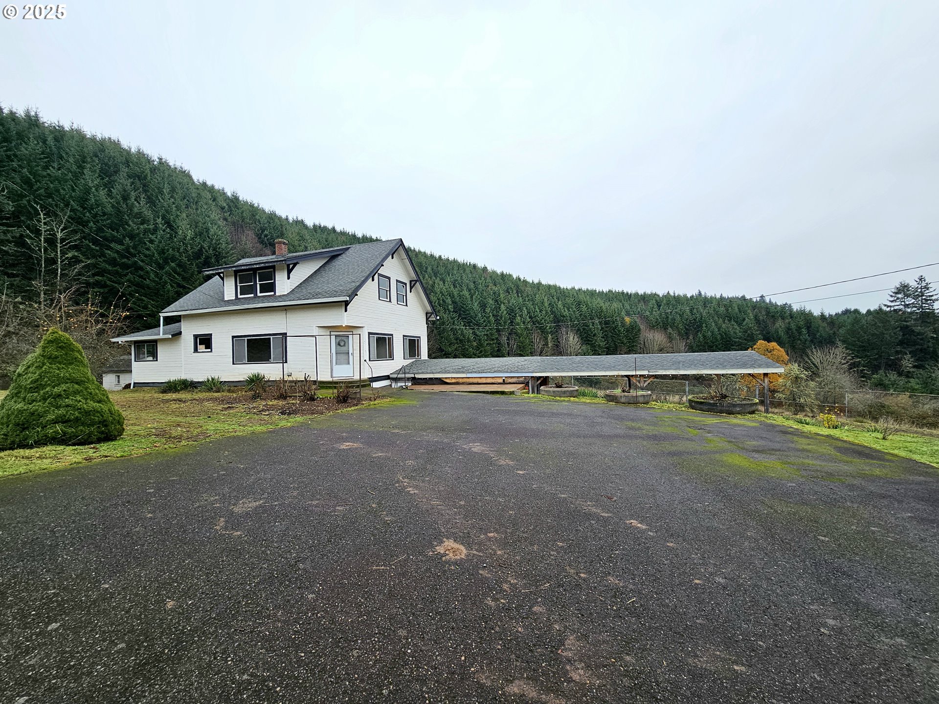 32373 Southwest JP W Road Scappoose, OR 97056 - Photo 3 of 44 a view of a house with a yard