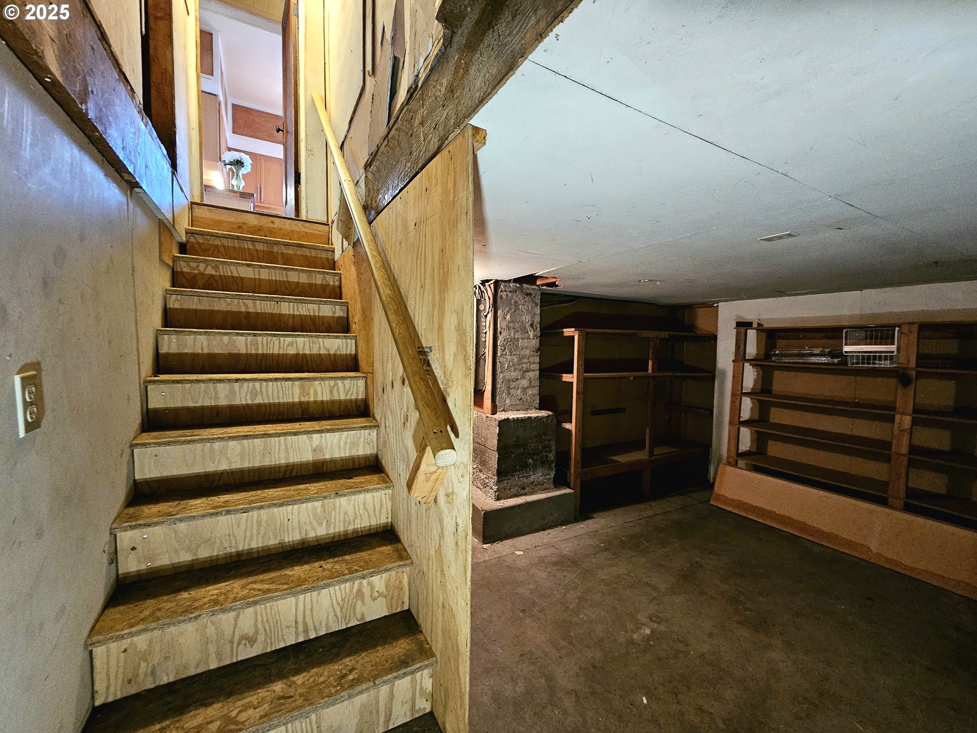 32373 Southwest JP W Road Scappoose, OR 97056 - Photo 32 of 44 a view of an empty room with stairs