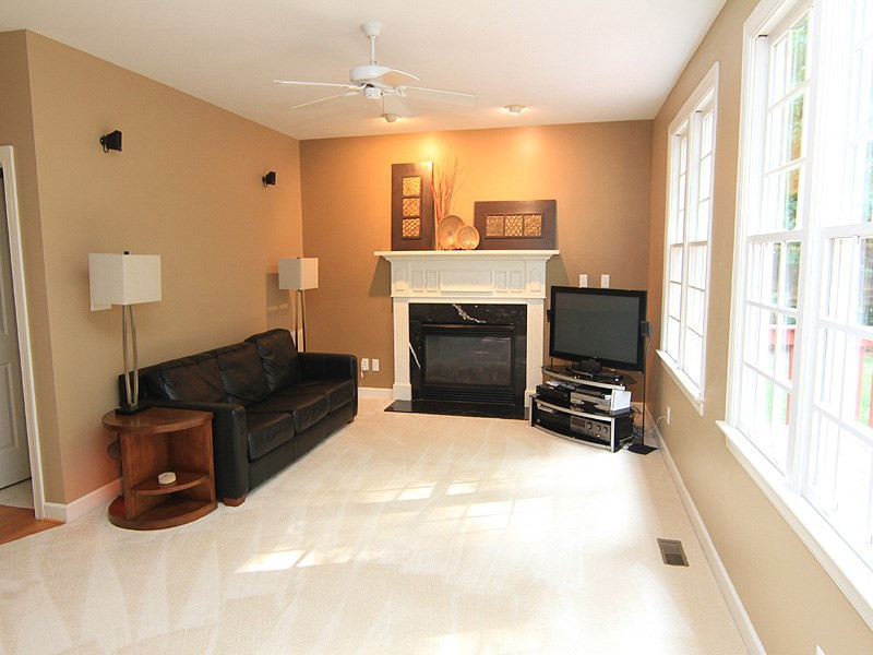 1717 Chestnut Hill Road Wake Forest, NC 27587 - Photo 25 of 25 Gas log fireplace. New carpet. Windows overlooking backyard. Floor plan open to kitchen. Family Room