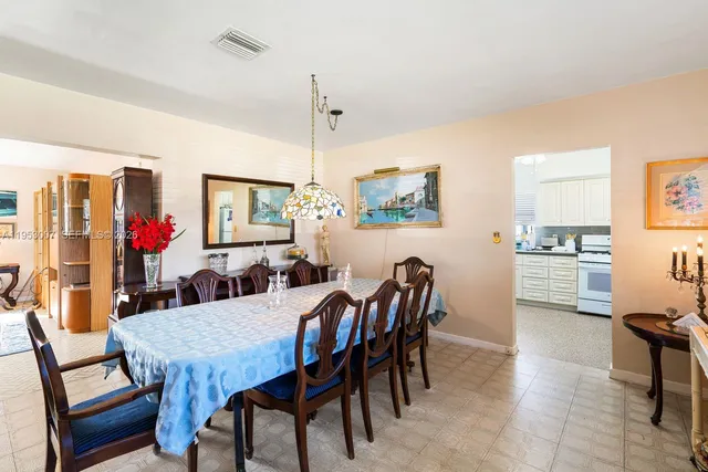 a view of a dining room with furniture