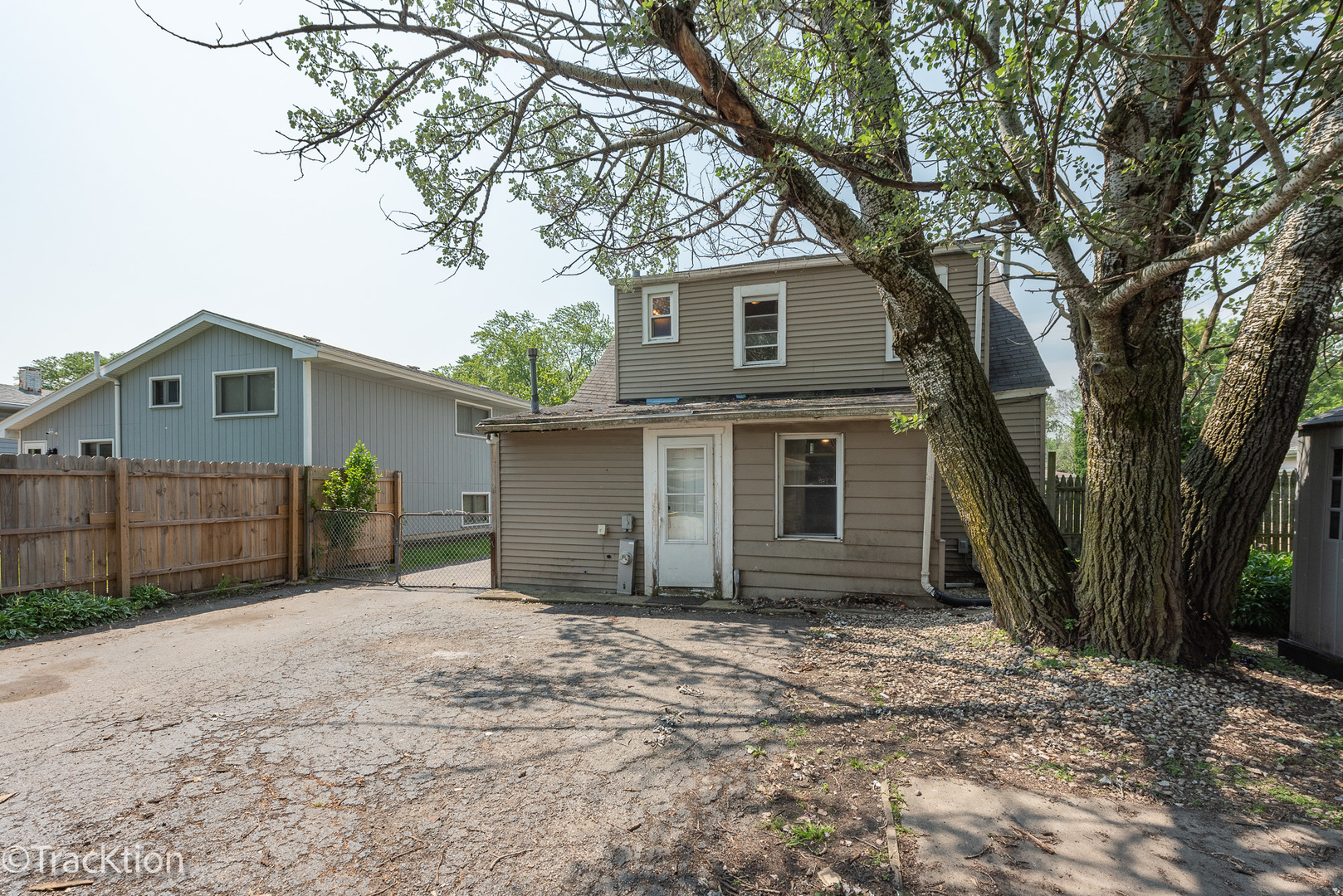910 East Krage Drive Addison, IL 60101 - Photo 11 of 11 a front view of a house with a yard and garage