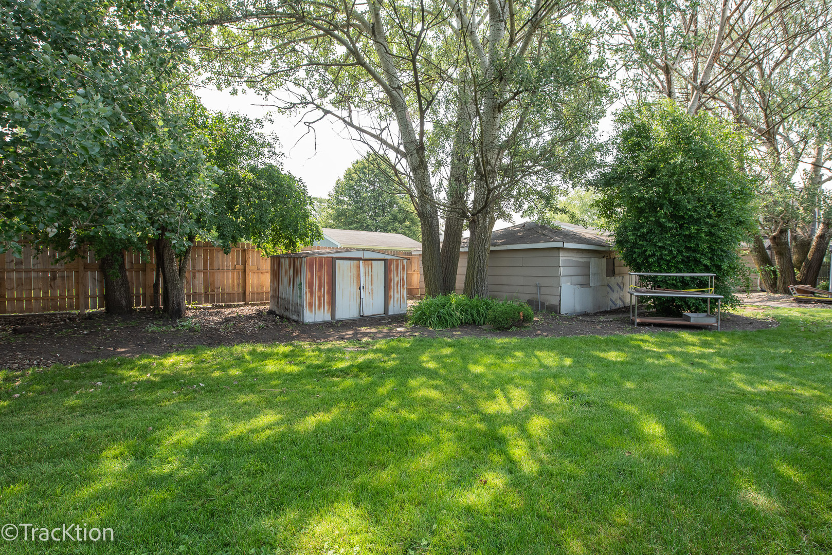 910 East Krage Drive Addison, IL 60101 - Photo 10 of 11 a view of a house with backyard and sitting area