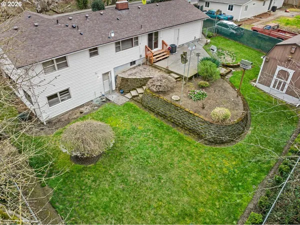 a view of a yard with an outdoor space