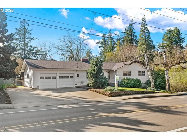 a view of a building and trees