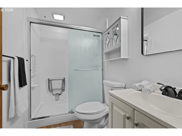 a view of an empty room with storage