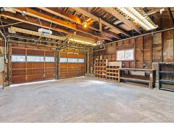a view of a hallway with staircase