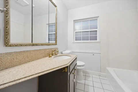a bathroom with a sink and a vanity