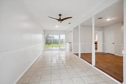 a view of an empty room and window