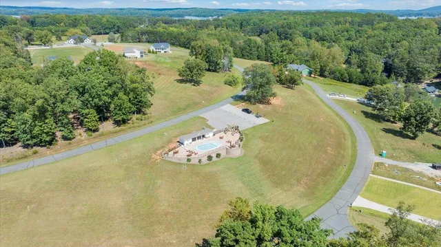 a view of a lake with a yard