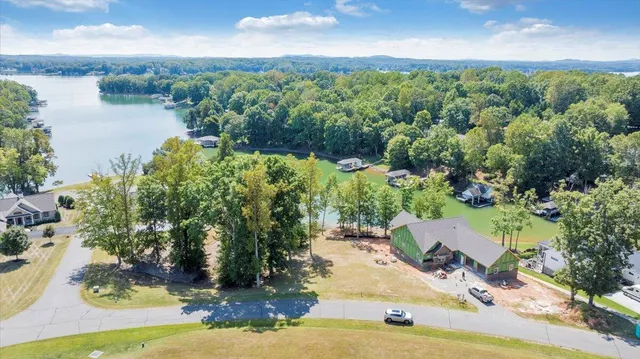 a view of a lake with a yard