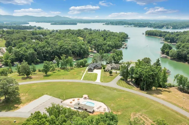 a view of a swimming pool with a patio