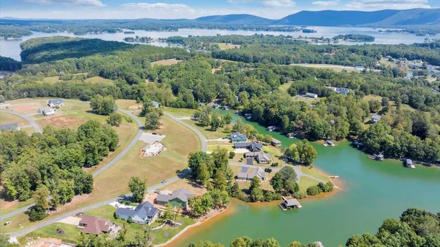 an aerial view of a residential houses with outdoor space