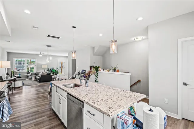 a view of a kitchen and dining room