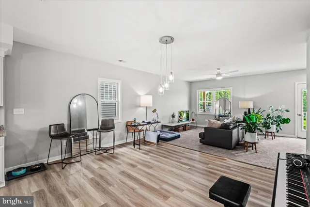 a view of a livingroom with furniture a fireplace