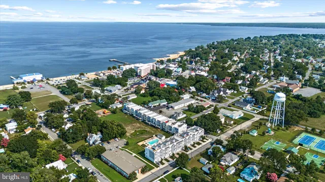 a view of a yard with an ocean