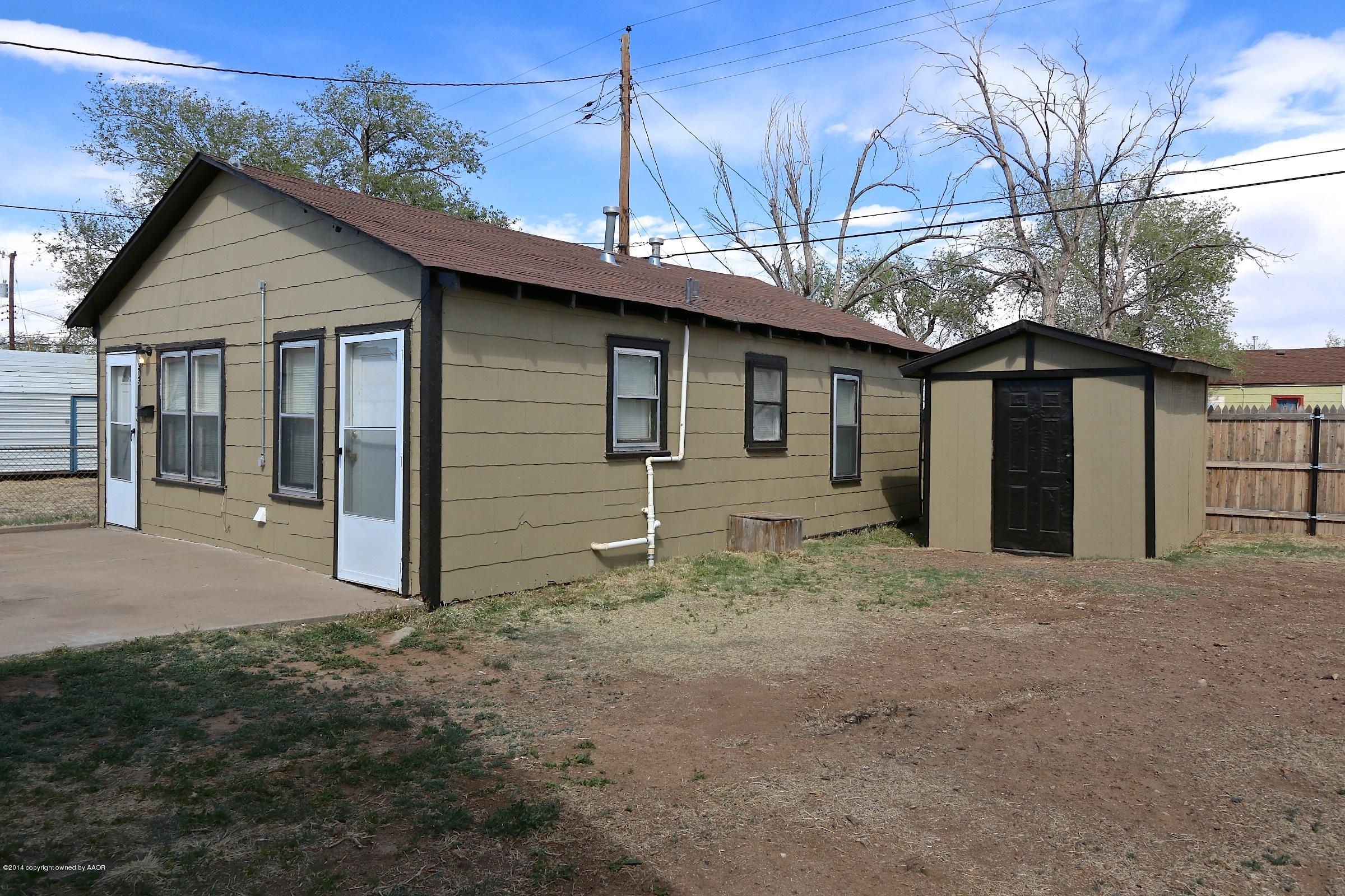 4205 South Tyler Street Amarillo, TX 79110 - Photo 13 of 19 a view of a house with a yard