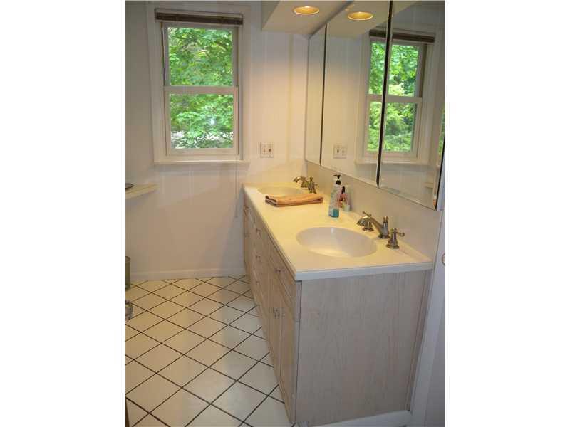 6621 Darlington Road Pittsburgh, PA 15217 - Photo 19 of 25 Full Bath. ~FULL BATH ON 2ND FLOOR WITH DOUBLE VANITY~INSET LIGHTING~LARGE MIRROR~TILE FLOORING~DON T MISS THE ADDITIONAL STORAGE AREA BEHIND THE BATHROOM DOOR~