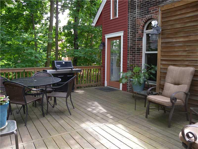 6621 Darlington Road Pittsburgh, PA 15217 - Photo 23 of 25 Exterior Back. ~STEP OUTSIDE TO RELAX ON THE DECK AND TAKE IN YOUR SURROUNDINGS~DOOR LEADS TO MUDROOM OFF KITCHEN AREA~ARCHED WINDOW IN KITCHEN~