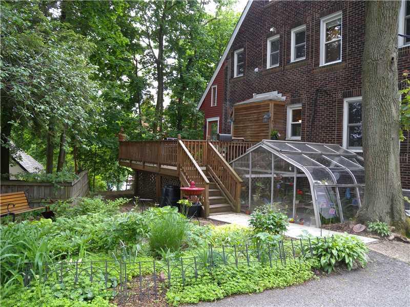 6621 Darlington Road Pittsburgh, PA 15217 - Photo 24 of 25 Exterior Back. ~GET YOUR GREEN THUMB READY~NOTICE THE GREENHOUSE WHICH HAS ACCESS FROM THE BASEMENT~IT S EVEN HEATED~LUSH GREENERY~