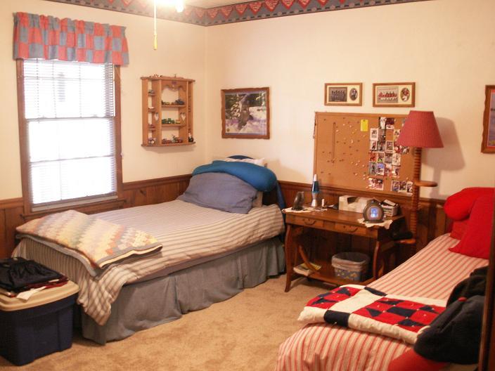 9820 Roanoke Road Elliston, VA 24087 - Photo 19 of 23 a bedroom with a bed and a window