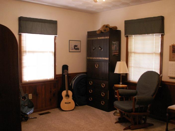 9820 Roanoke Road Elliston, VA 24087 - Photo 20 of 23 a view of a workspace with furniture and a window