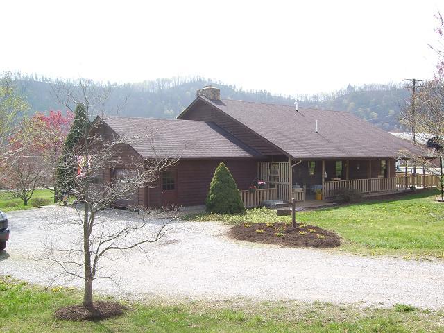 9820 Roanoke Road Elliston, VA 24087 - Photo 3 of 23 a view of a house with a yard