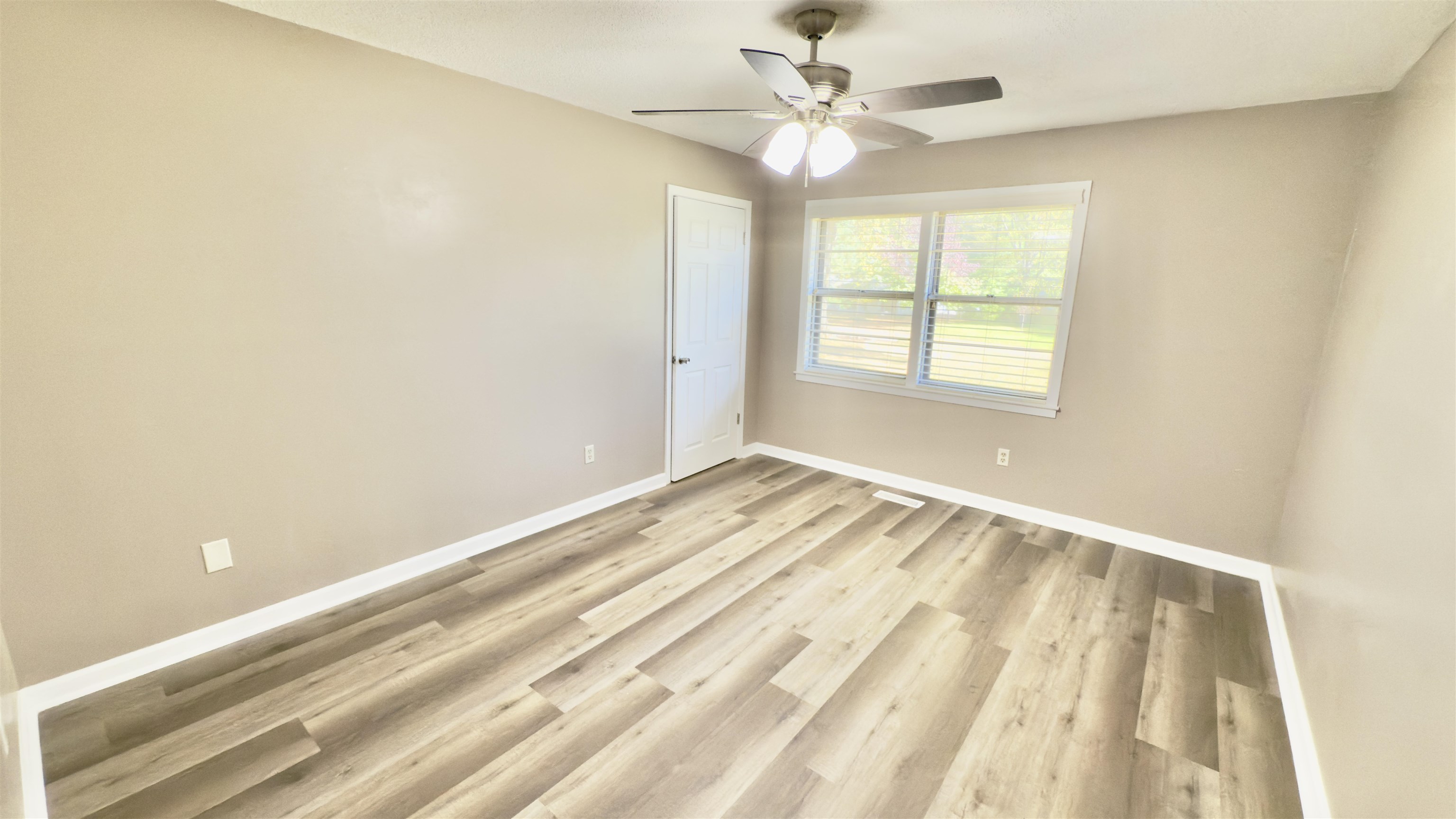 2563 Hacks Cross Road Germantown, TN 38138 - Photo 16 of 28 a view of an empty room with a window