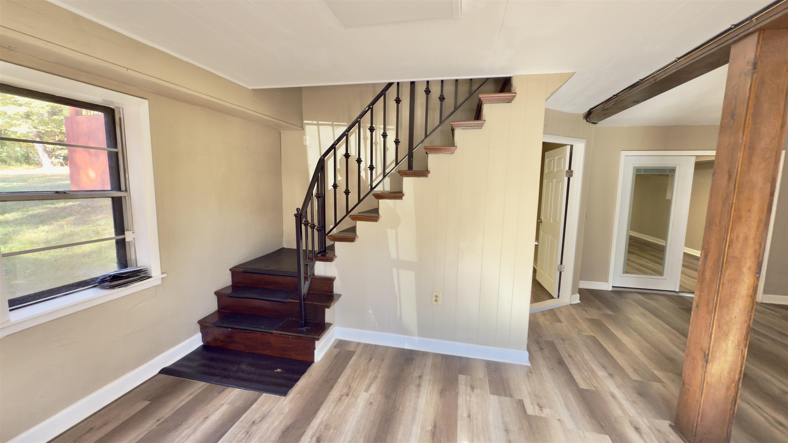 2563 Hacks Cross Road Germantown, TN 38138 - Photo 17 of 28 a view of front door with wooden floor and stairs