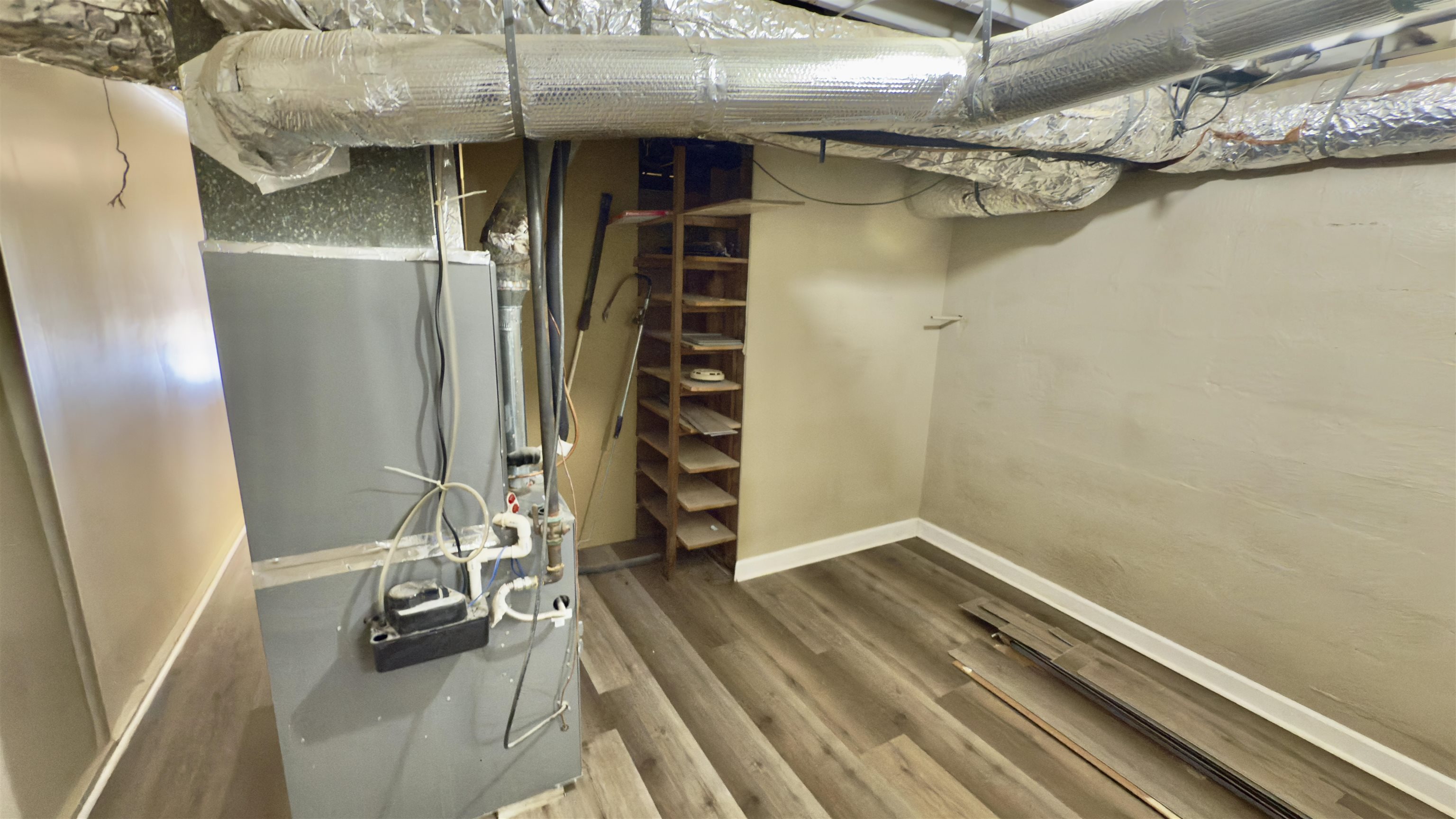 2563 Hacks Cross Road Germantown, TN 38138 - Photo 25 of 28 a view of walk in closet with clothes and shoes