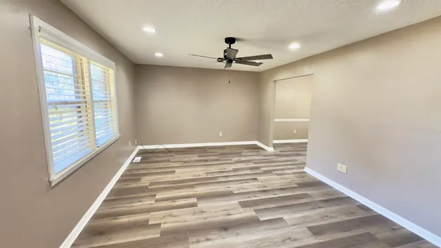 a view of a livingroom with a staircase