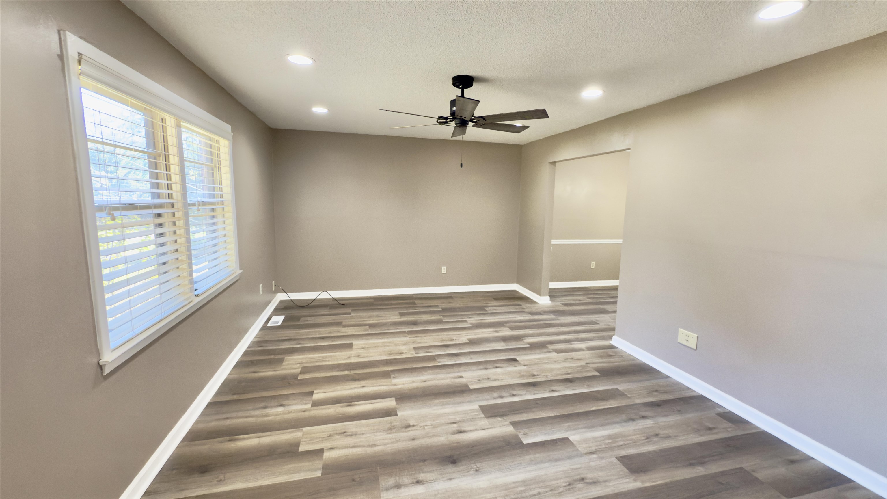 2563 Hacks Cross Road Germantown, TN 38138 - Photo 5 of 28 a view of a livingroom with a staircase