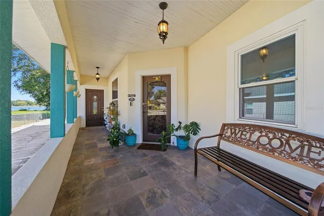 a view of front door with outdoor seating