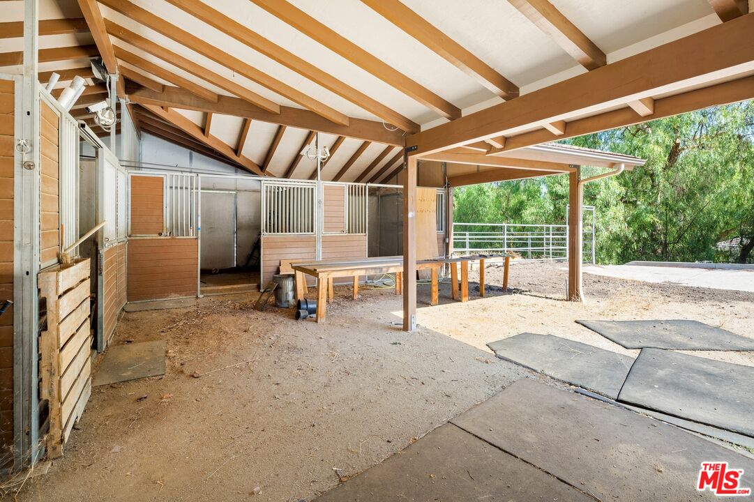 24930 Eldorado Meadow Road Hidden Hills, CA 91302 - Photo 8 of 10 a view of a empty room with a garage