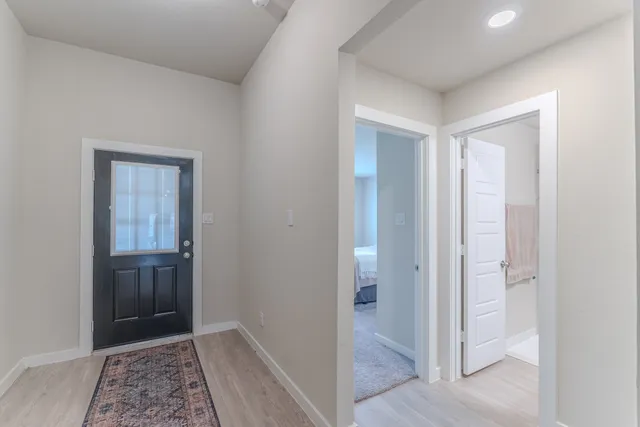 a view of hallway with walk in closet