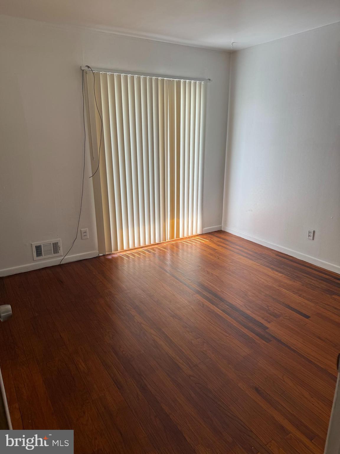 2 Larkin Road Burlington, NJ 08016 - Photo 13 of 24 an empty room with wooden floor and windows