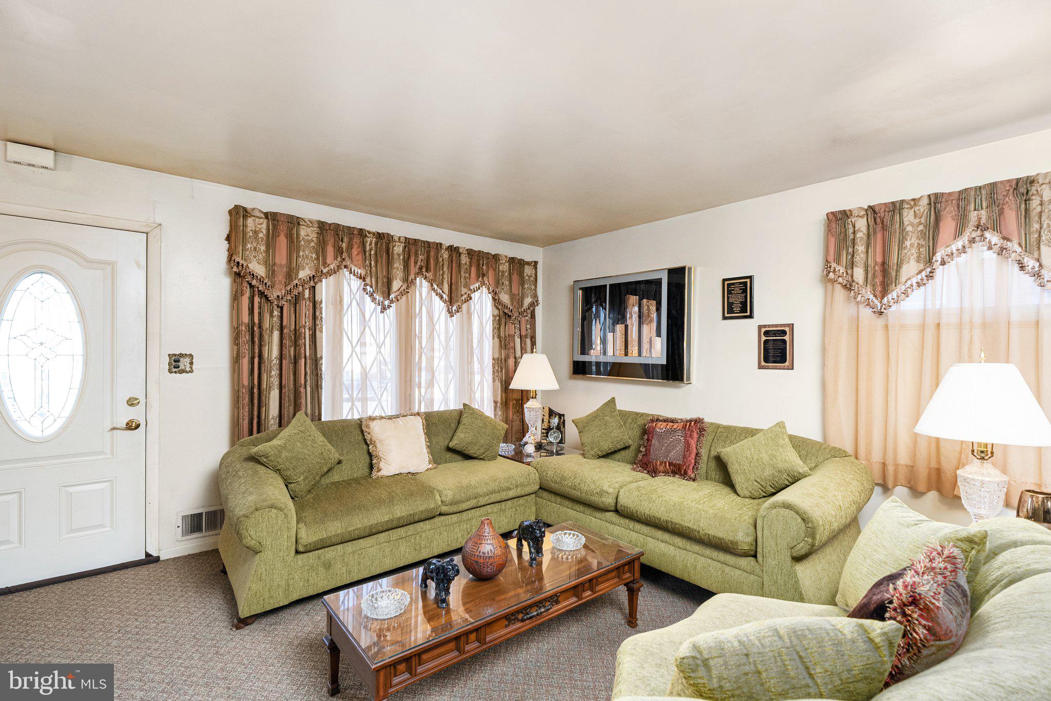2 Larkin Road Burlington, NJ 08016 - Photo 4 of 24 a living room with furniture and a large window