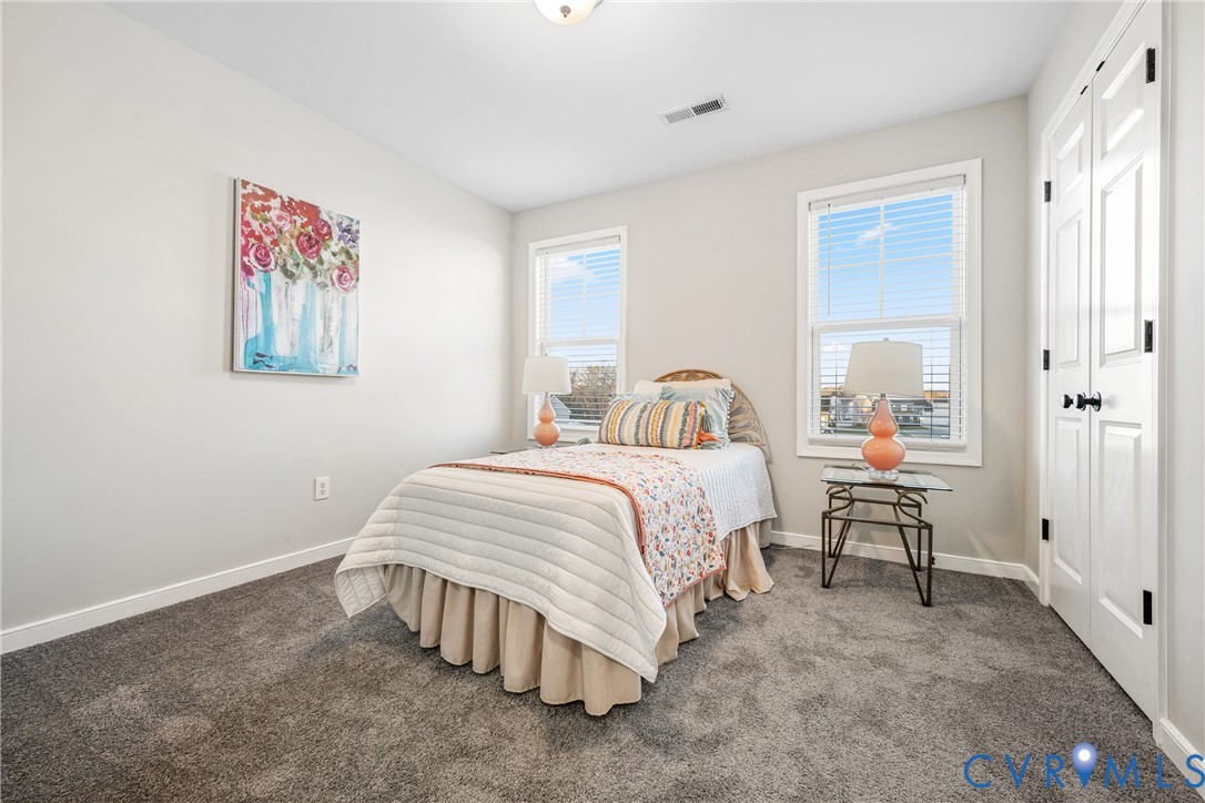 7401 Appelman Road Chesterfield, VA 23832 - Photo 14 of 17 a bedroom with a bed and a painting on the wall