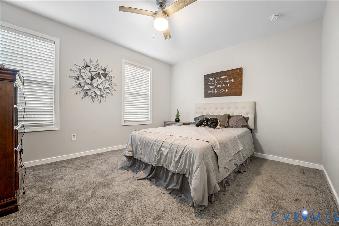 7401 Appelman Road Chesterfield, VA 23832 - Photo 15 of 17 a spacious bedroom with a bed and a window