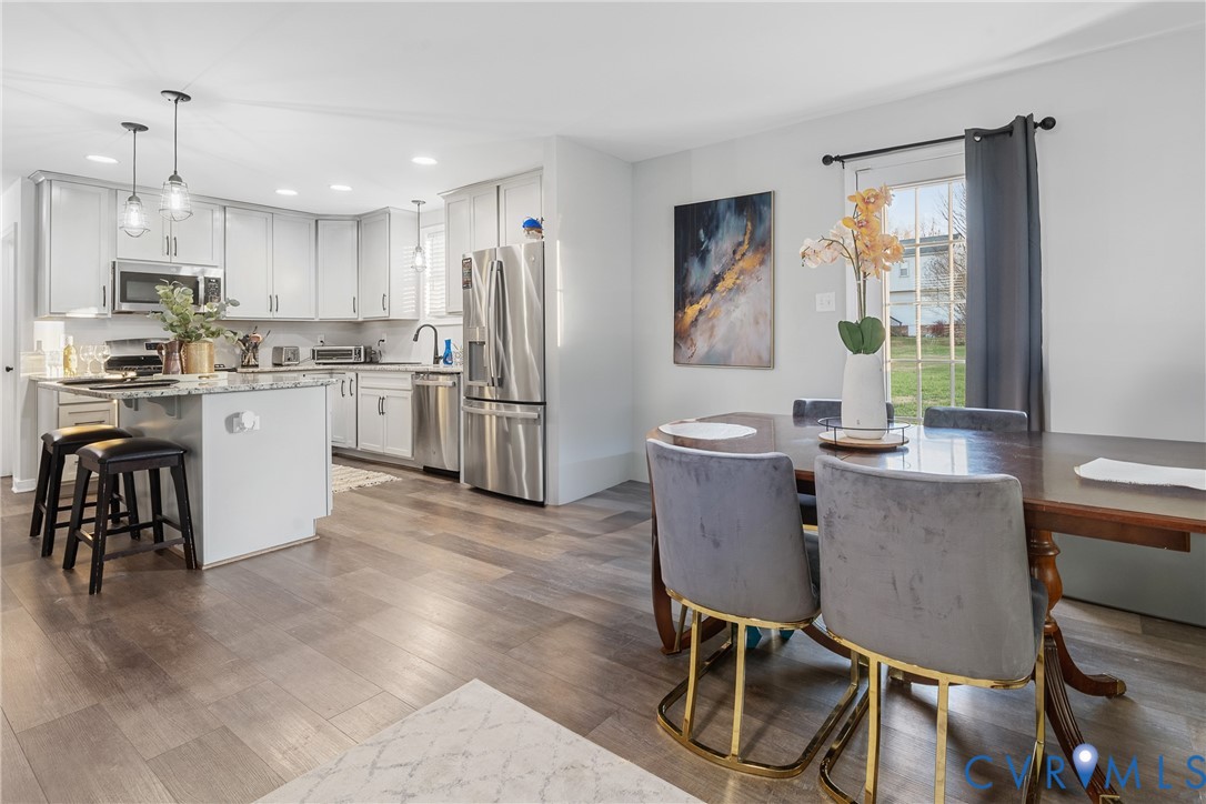 7401 Appelman Road Chesterfield, VA 23832 - Photo 6 of 17 a view of a dining room with furniture window and wooden floor