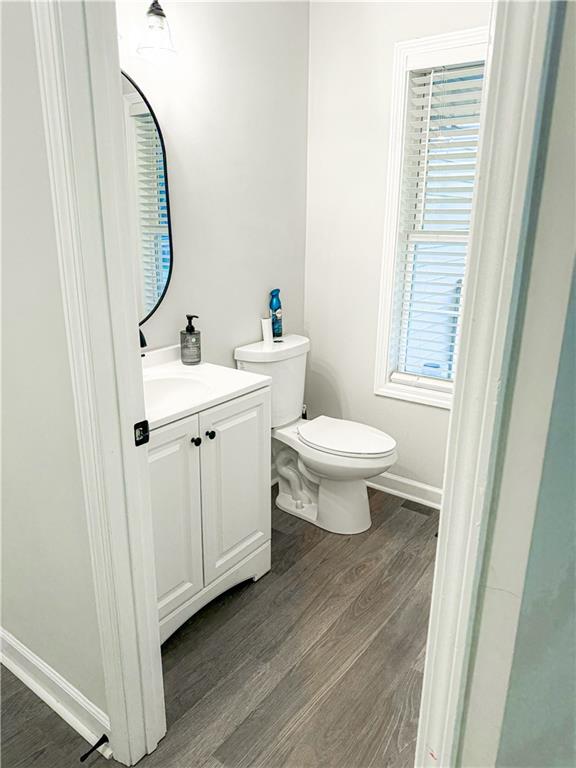1264 GA Highway 211 Winder, GA 30680 - Photo 13 of 69 a bathroom with a toilet sink and mirror