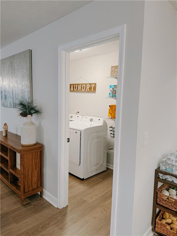 1264 GA Highway 211 Winder, GA 30680 - Photo 28 of 69 a utility room with washer and dryer