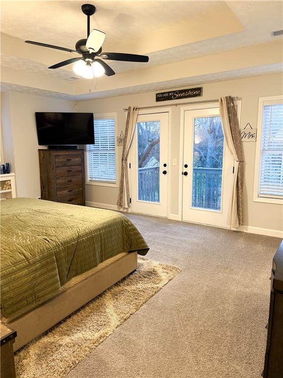 1264 GA Highway 211 Winder, GA 30680 - Photo 41 of 69 a spacious bedroom with a bed and a chandelier