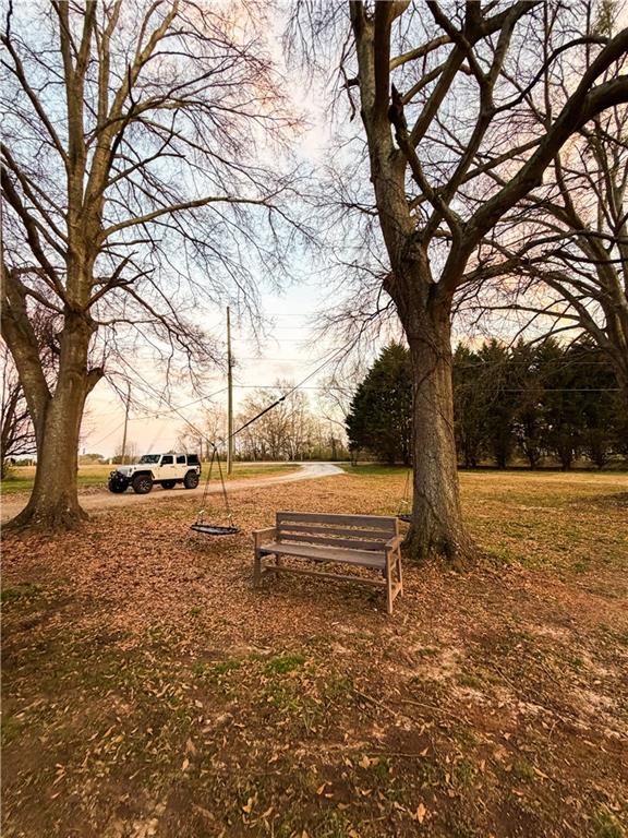 1264 GA Highway 211 Winder, GA 30680 - Photo 66 of 69 a view of outdoor space with lots of trees
