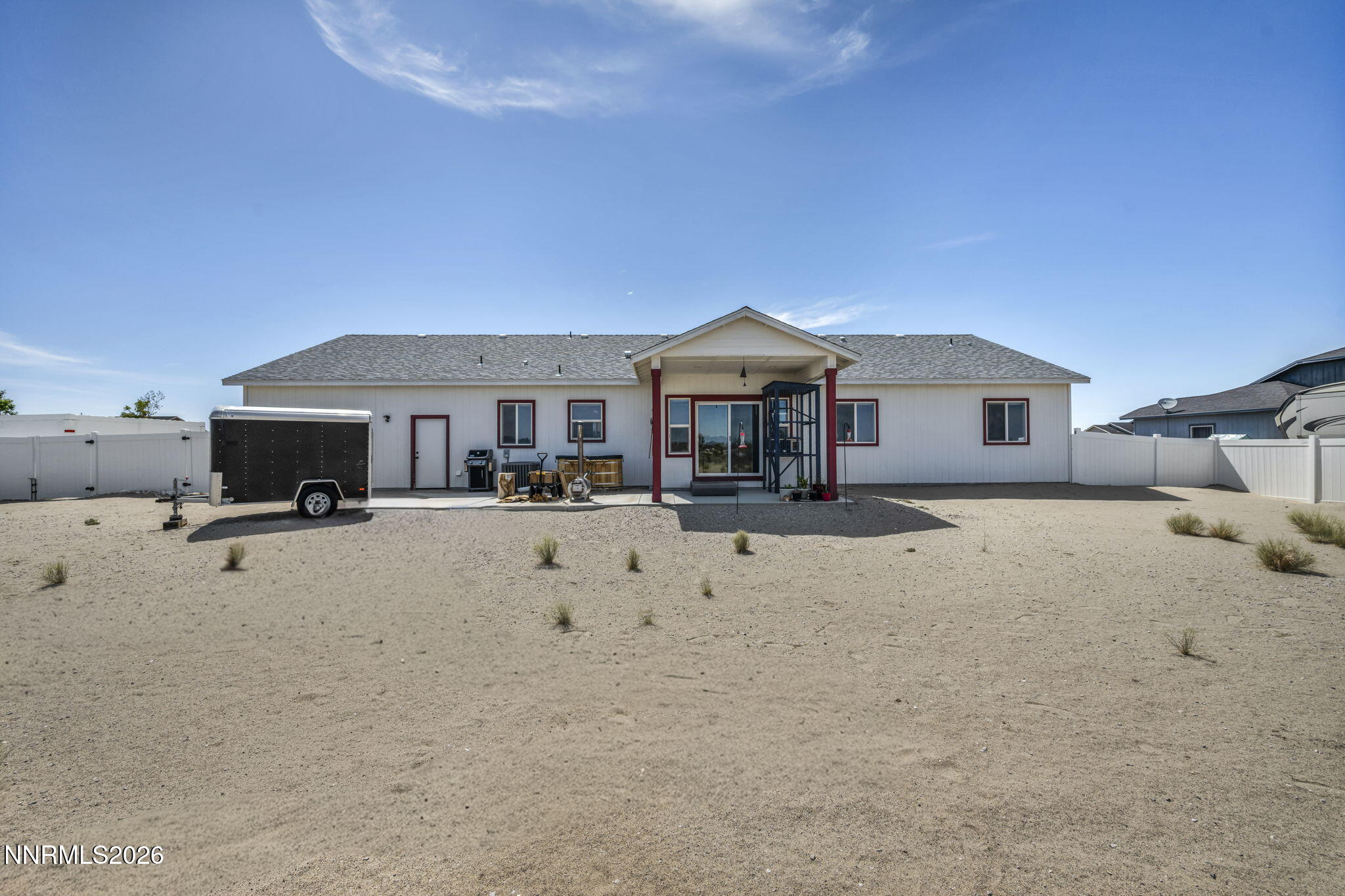 1286 Sky Ridge Drive Fallon, NV 89406 - Photo 44 of 49 a view of a house with a yard and sitting area