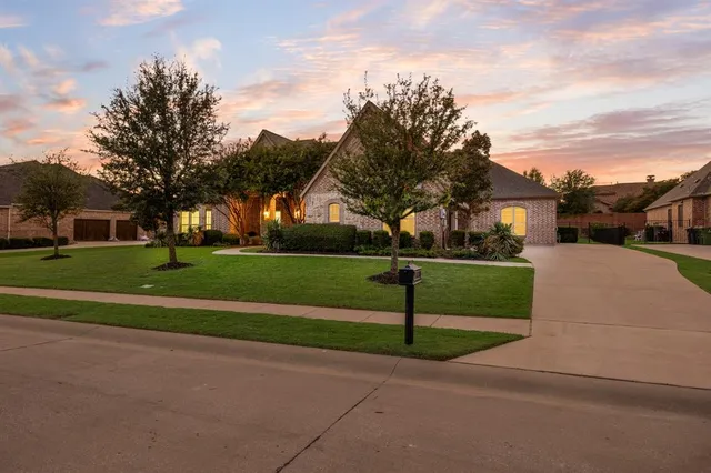 a view of a park with houses on both side