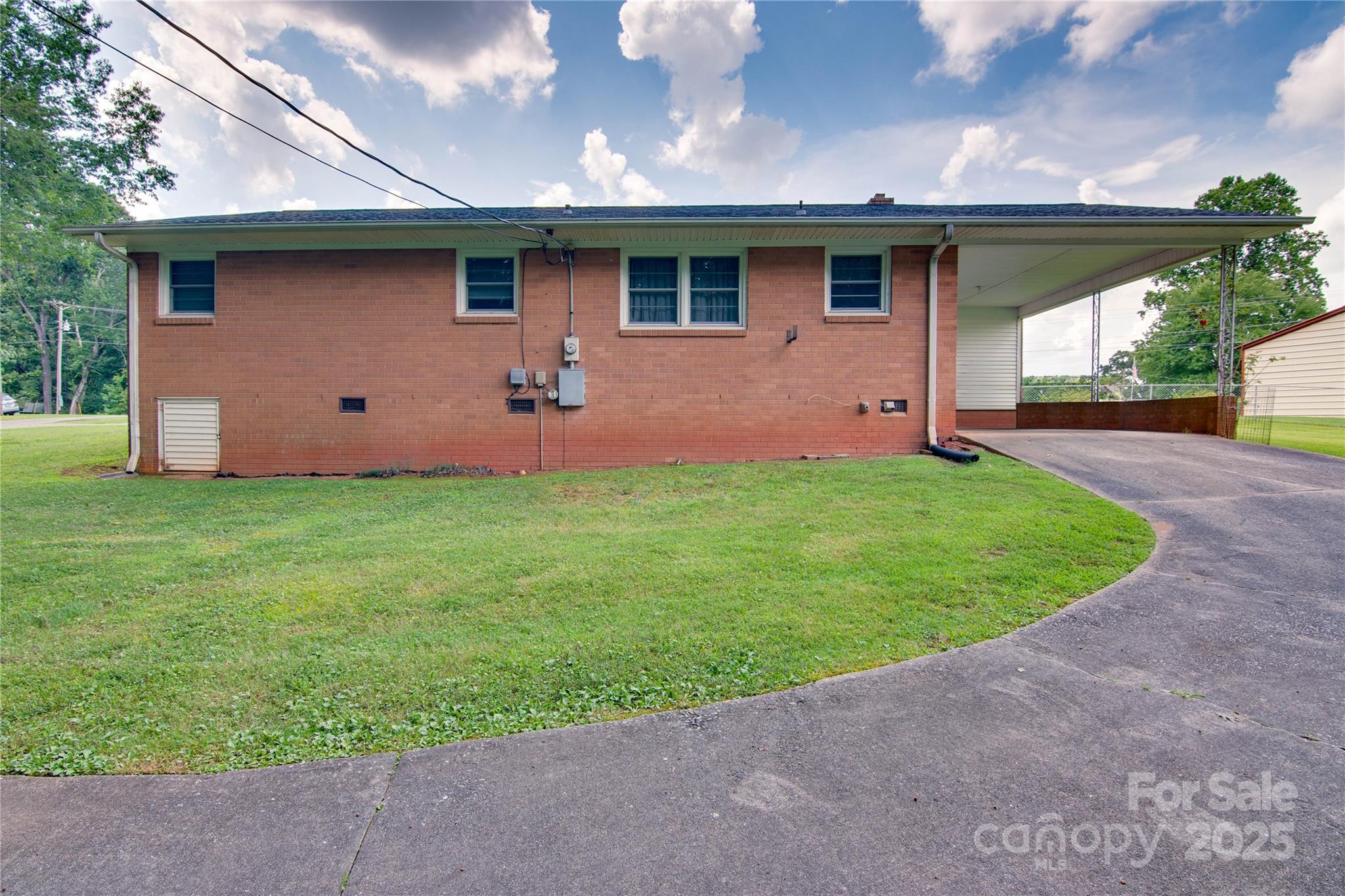 2319 Tin Mine Road Lincolnton, NC 28092 - Photo 2 of 30 a front view of house with yard and garage